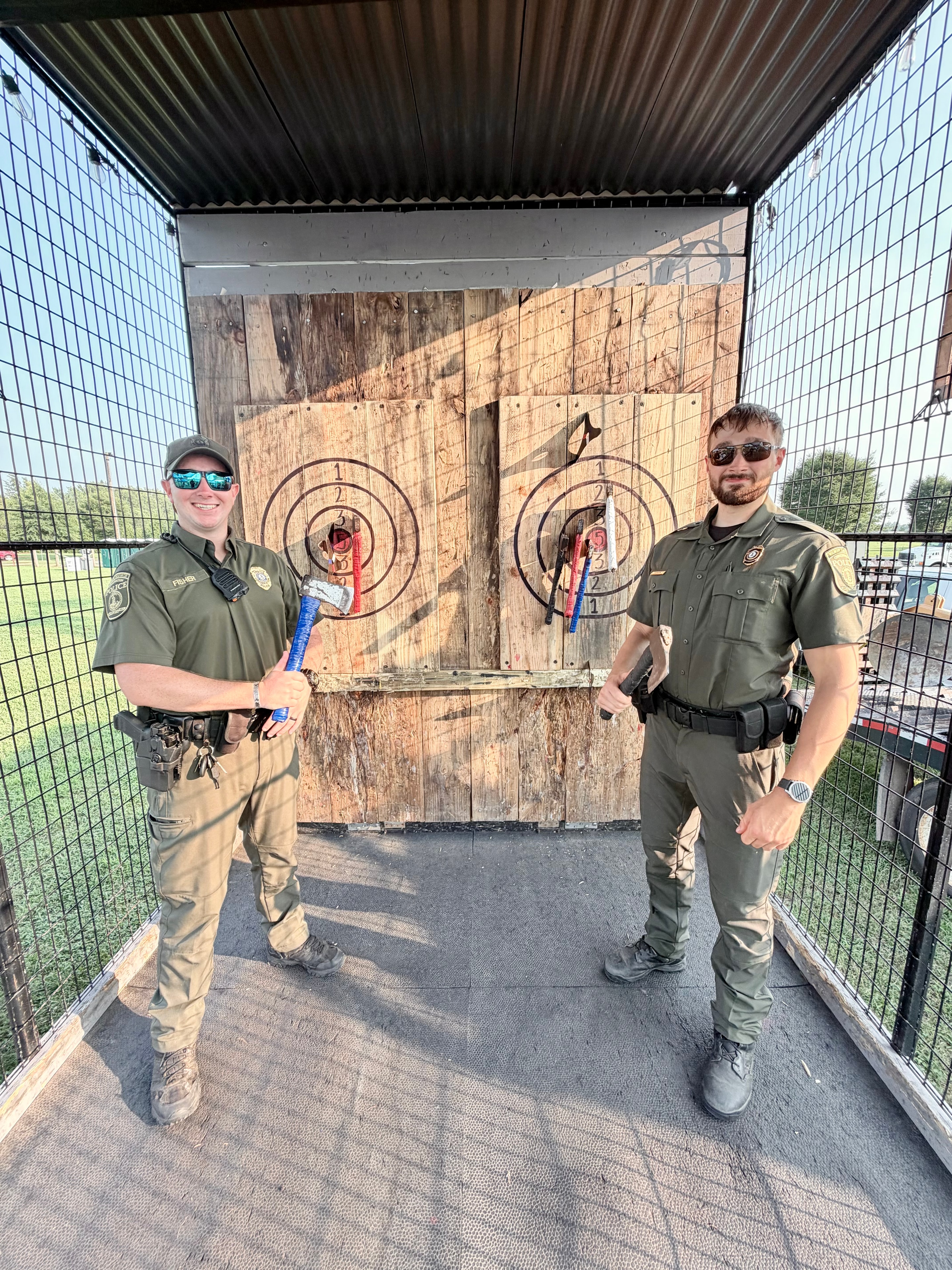 Corporate team laughing together at outdoor activity